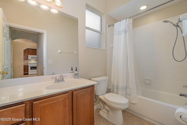 1869 Tullagee Ave, Melbourne, FL 32940 - bathroom featuring tile patterned floors, vanity, and shower / bath combo with shower curtain