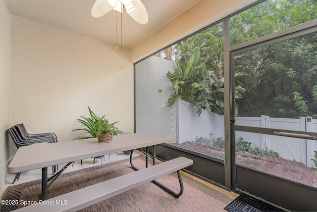 1869 Tullagee Ave, Melbourne, FL 32940 - sunroom with a textured wall and wood finished floors
