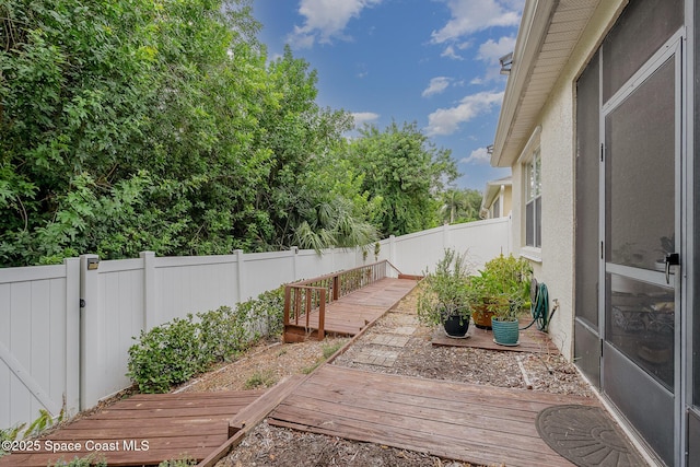 1869 Tullagee Ave, Melbourne, FL 32940 - deck with a fenced backyard