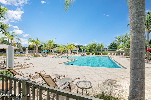 1869 Tullagee Ave, Melbourne, FL 32940 - community pool featuring a patio area