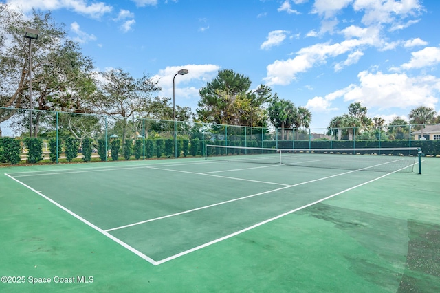 1869 Tullagee Ave, Melbourne, FL 32940 - view of tennis court with community basketball court