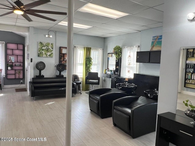 277 Mcleod St, Merritt Island, FL 32953 - living room with ceiling fan, light wood-type flooring, and a drop ceiling