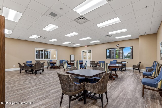 2690 Camberly Cir, Melbourne, FL 32940 - dining area with wood finished floors and a paneled ceiling