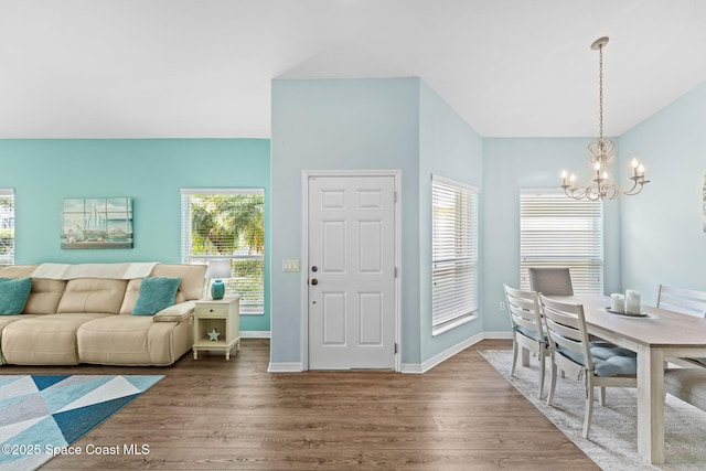 2690 Camberly Cir, Melbourne, FL 32940 - entrance foyer with a chandelier and wood finished floors