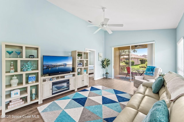 2690 Camberly Cir, Melbourne, FL 32940 - living area with ceiling fan, dark wood-style floors, and high vaulted ceiling