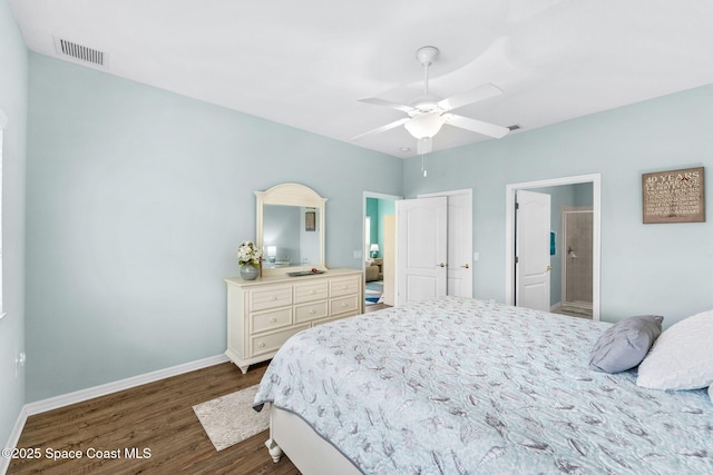 2690 Camberly Cir, Melbourne, FL 32940 - bedroom featuring dark wood-style flooring, ensuite bath, and ceiling fan