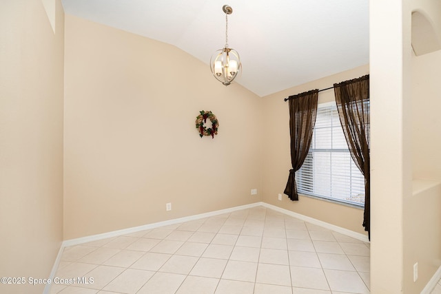 2383 Glasbern Cir, Melbourne, FL 32904 - empty room with vaulted ceiling, a chandelier, and light tile patterned floors