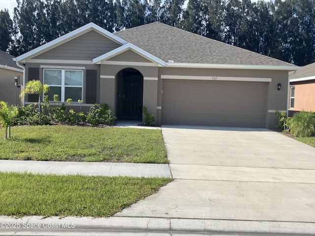 967 Trinity St, Rockledge, FL 32955 - single story home with a garage, driveway, stucco siding, a front yard, and a shingled roof