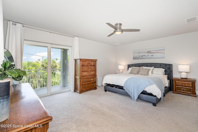 120 Heron Dr, Melbourne Beach, FL 32951 - carpeted bedroom with access to outside and a ceiling fan