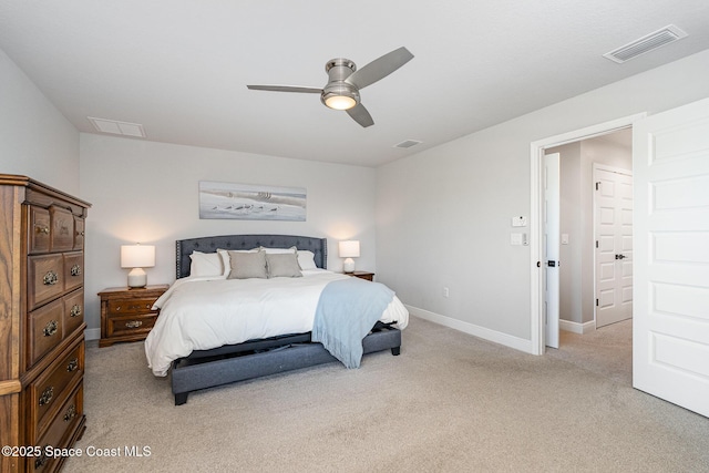 120 Heron Dr, Melbourne Beach, FL 32951 - bedroom with light carpet and a ceiling fan