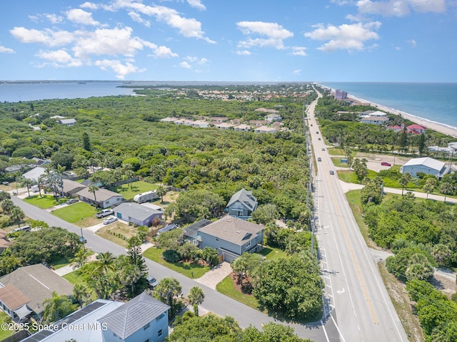 120 Heron Dr, Melbourne Beach, FL 32951 - aerial view of residential area with a nearby body of water and a highway