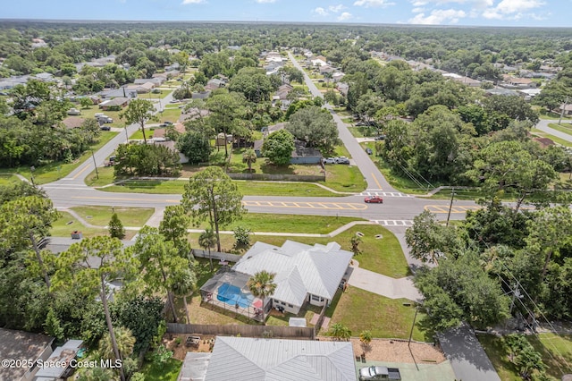 7045 Grissom Pkwy, Cocoa, FL 32927 - aerial perspective of suburban area