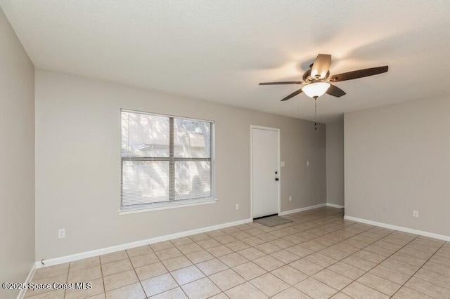 964 Mcfarlan Ave, Fort Walton Beach, FL 32547 - spare room with a ceiling fan and light tile patterned floors