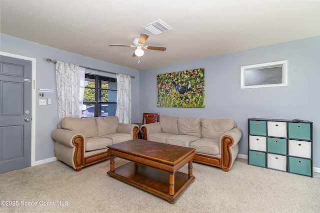 583 Mandan Ave, Melbourne, FL 32935 - living room with a ceiling fan and carpet floors