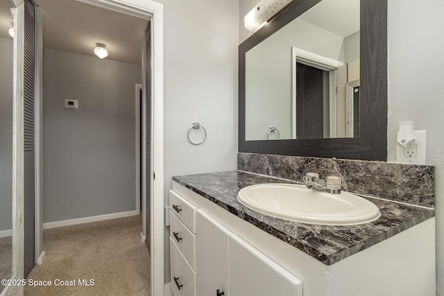583 Mandan Ave, Melbourne, FL 32935 - bathroom with vanity and baseboards