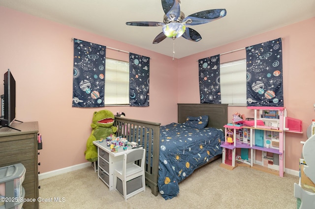 583 Mandan Ave, Melbourne, FL 32935 - carpeted bedroom featuring baseboards and ceiling fan