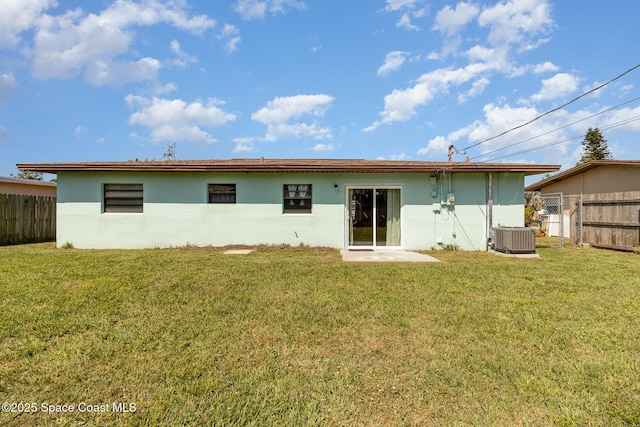 583 Mandan Ave, Melbourne, FL 32935 - rear view of house with stucco siding