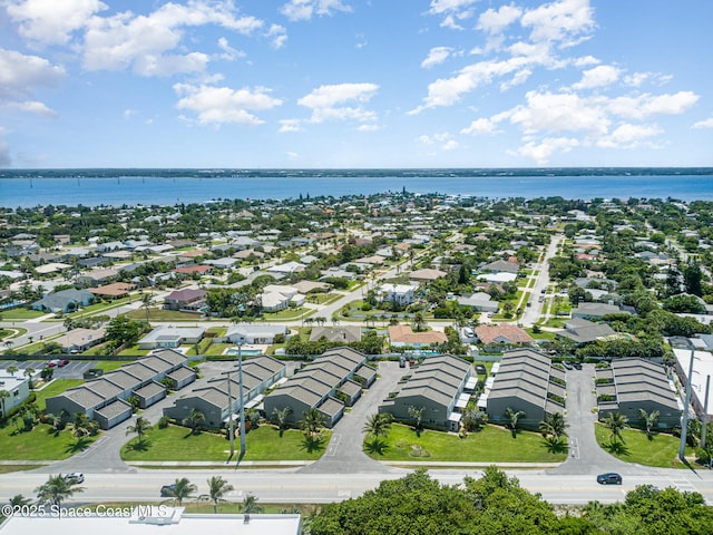 1708 Atlantic St Unit 4F, Melbourne Beach, FL 32951 - aerial perspective of suburban area featuring a large body of water