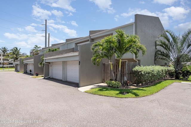 1708 Atlantic St Unit 4F, Melbourne Beach, FL 32951 - view of property exterior with stucco siding