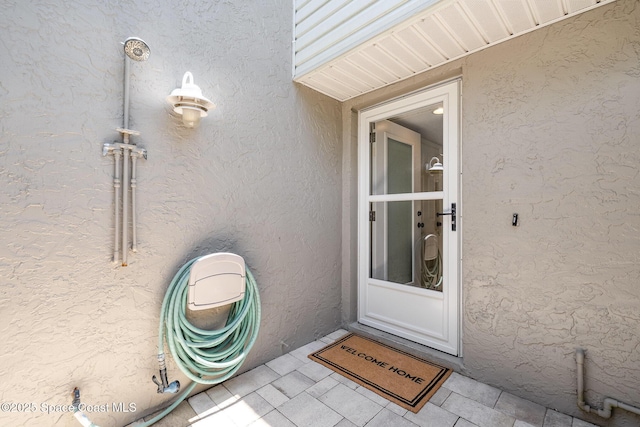 1708 Atlantic St Unit 4F, Melbourne Beach, FL 32951 - entrance to property featuring stucco siding