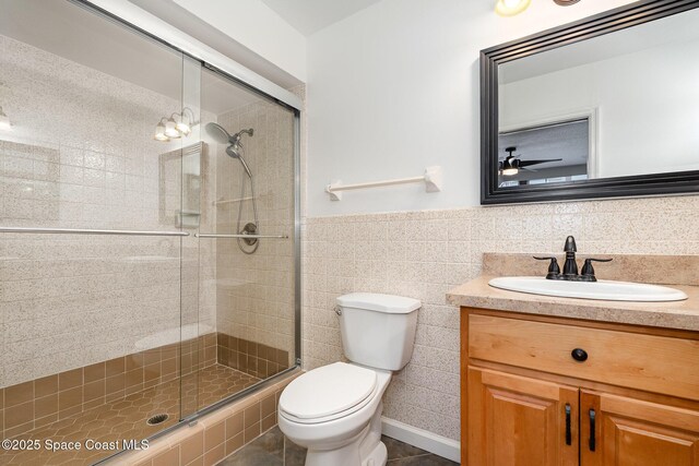 1708 Atlantic St Unit 4F, Melbourne Beach, FL 32951 - full bath featuring vanity, a shower stall, and wainscoting