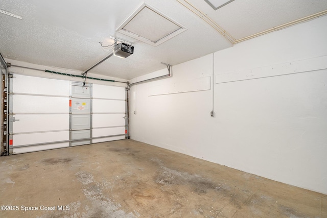 1708 Atlantic St Unit 4F, Melbourne Beach, FL 32951 - garage featuring a garage door opener