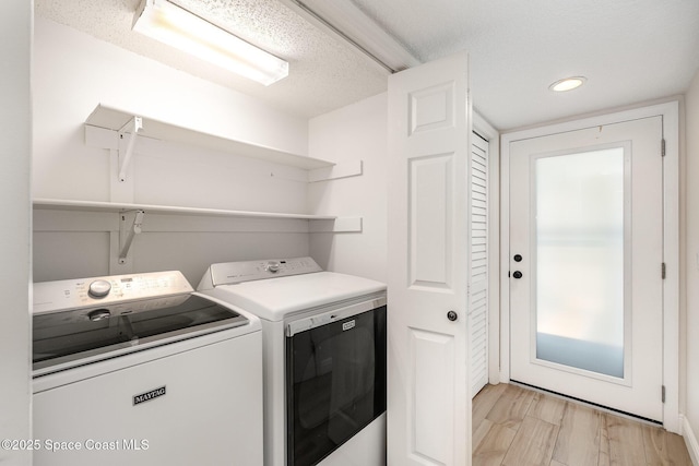 1708 Atlantic St Unit 4F, Melbourne Beach, FL 32951 - washroom with washing machine and dryer and recessed lighting