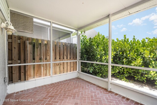 1708 Atlantic St Unit 4F, Melbourne Beach, FL 32951 - unfurnished sunroom with plenty of natural light