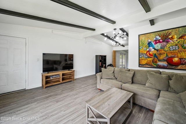 1056 Noreen Blvd, Rockledge, FL 32955 - living area featuring a chandelier and wood finished floors