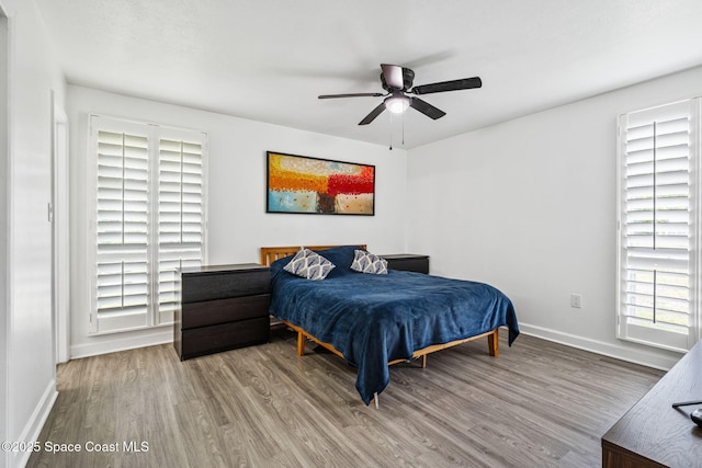 1056 Noreen Blvd, Rockledge, FL 32955 - bedroom with wood finished floors and a ceiling fan