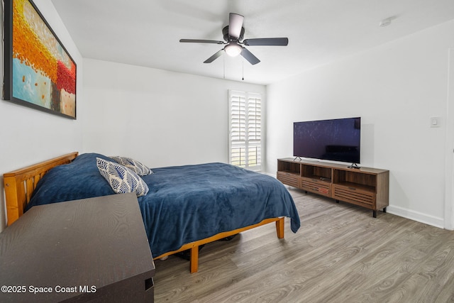 1056 Noreen Blvd, Rockledge, FL 32955 - bedroom featuring wood finished floors and a ceiling fan