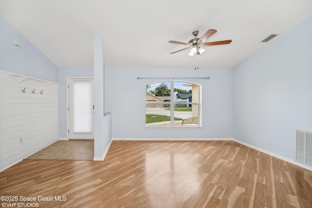183 Frante Ave NE, Palm Bay, FL 32907 - empty room featuring light wood-style flooring, a ceiling fan, and vaulted ceiling
