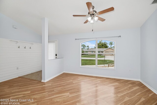 183 Frante Ave NE, Palm Bay, FL 32907 - spare room with light wood-style floors, a ceiling fan, and vaulted ceiling