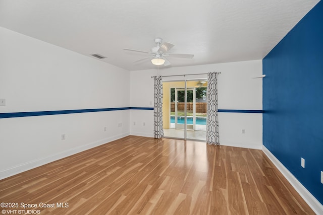 183 Frante Ave NE, Palm Bay, FL 32907 - spare room featuring ceiling fan and wood finished floors