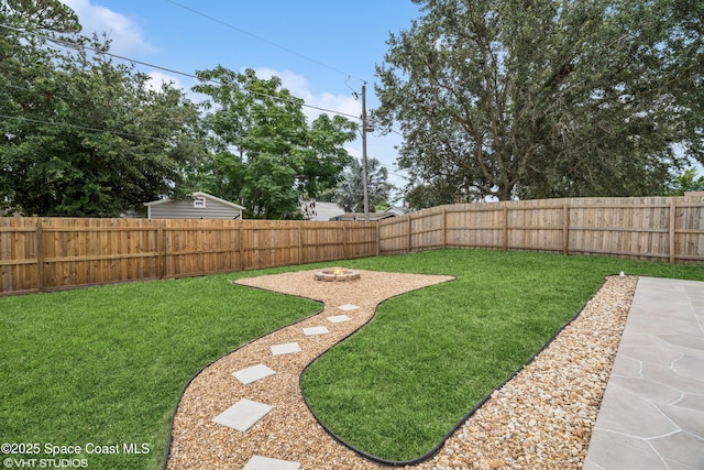 183 Frante Ave NE, Palm Bay, FL 32907 - fenced backyard with a patio