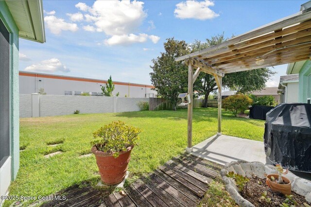 2627 Deercroft Dr, Melbourne, FL 32940 - fenced backyard with a patio area