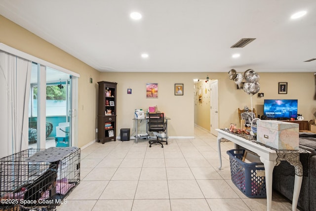 1565 Venus St, Merritt Island, FL 32953 - home office with recessed lighting and light tile patterned floors