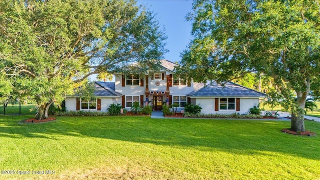 260 Utopia Cir, Merritt Island, FL 32952 - traditional-style house with stucco siding