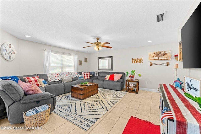 260 Utopia Cir, Merritt Island, FL 32952 - living room featuring tile patterned flooring, a textured ceiling, a ceiling fan, and recessed lighting