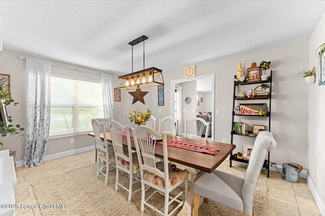 260 Utopia Cir, Merritt Island, FL 32952 - dining room with a textured ceiling and light tile patterned floors