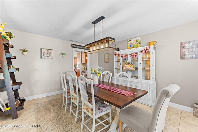 260 Utopia Cir, Merritt Island, FL 32952 - dining room featuring tile patterned flooring and baseboards