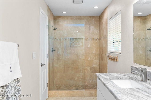 260 Utopia Cir, Merritt Island, FL 32952 - bathroom featuring vanity, a walk in shower, recessed lighting, and tile patterned floors