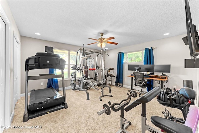 260 Utopia Cir, Merritt Island, FL 32952 - workout room featuring carpet floors, plenty of natural light, ceiling fan, recessed lighting, and a textured ceiling