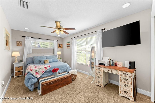 260 Utopia Cir, Merritt Island, FL 32952 - bedroom with light colored carpet and ceiling fan
