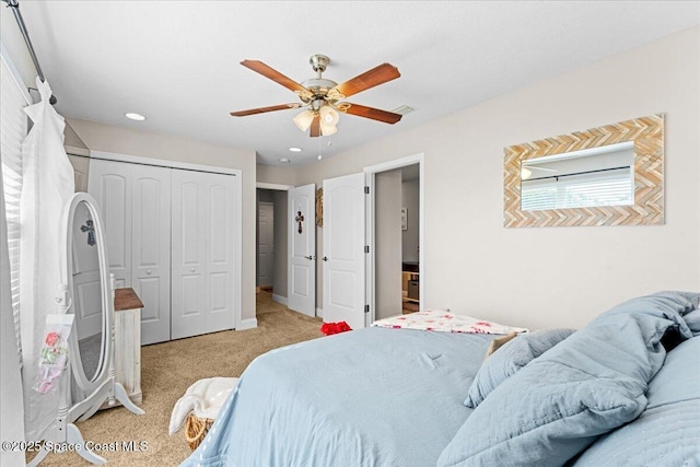 260 Utopia Cir, Merritt Island, FL 32952 - bedroom with light colored carpet, recessed lighting, a closet, and a ceiling fan