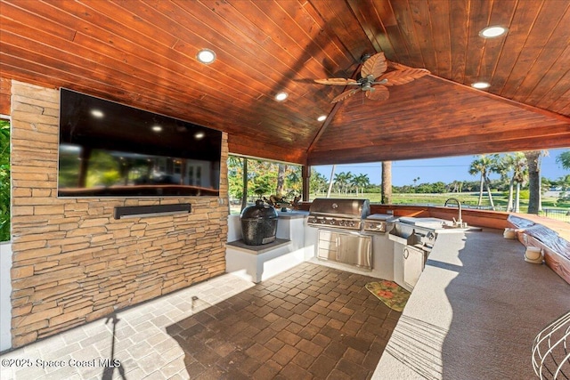 260 Utopia Cir, Merritt Island, FL 32952 - view of patio featuring an outdoor kitchen, a ceiling fan, and a gazebo