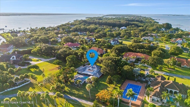 260 Utopia Cir, Merritt Island, FL 32952 - aerial view of residential area with a large body of water
