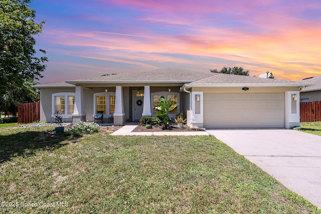1166 Morgan Cir NE, Palm Bay, FL 32905 - single story home with stucco siding, an attached garage, and concrete driveway