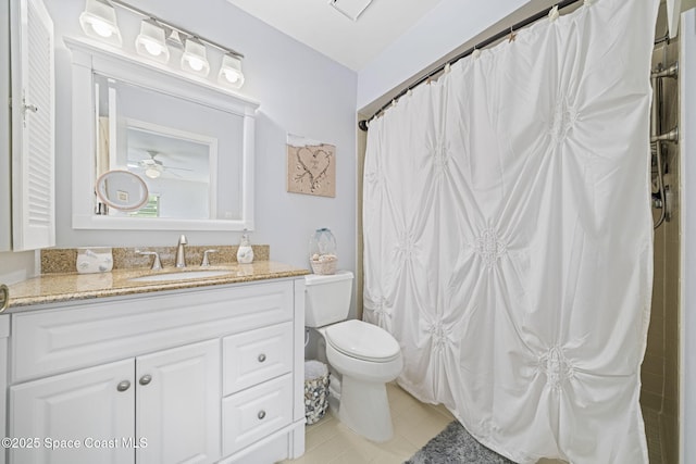 743 Palm Springs Cir, Satellite Beach, FL 32937 - full bathroom featuring vanity, tile patterned flooring, curtained shower, and a ceiling fan