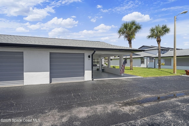743 Palm Springs Cir, Satellite Beach, FL 32937 - garage featuring driveway